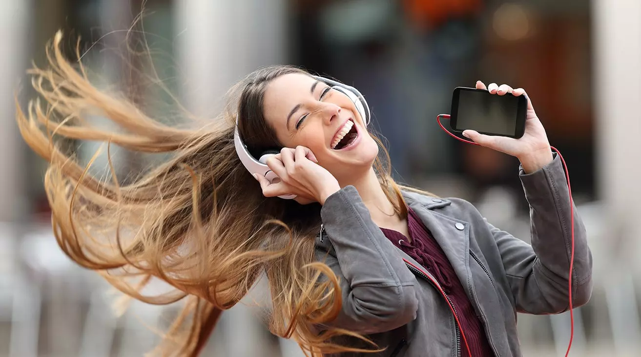 woman enjoying music
