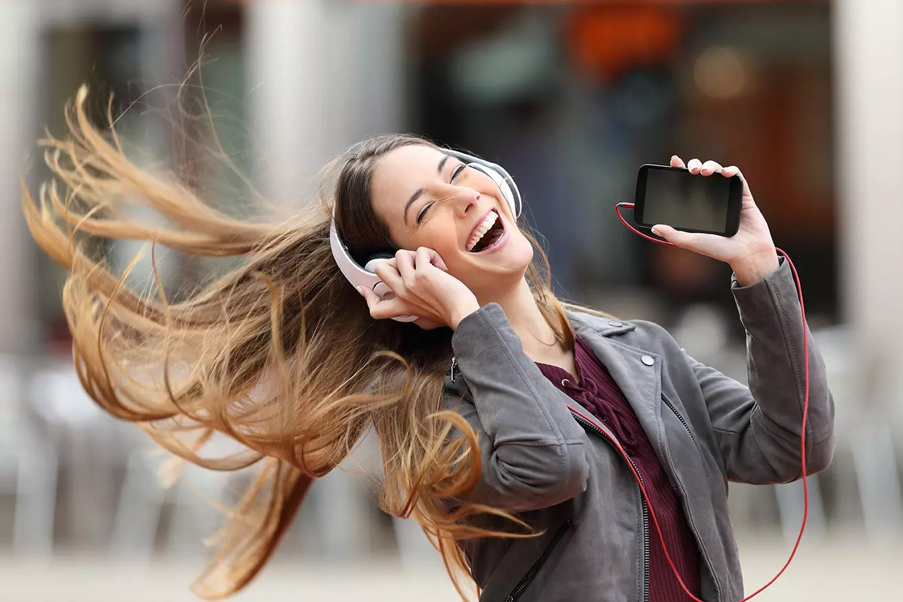 woman enjoying music