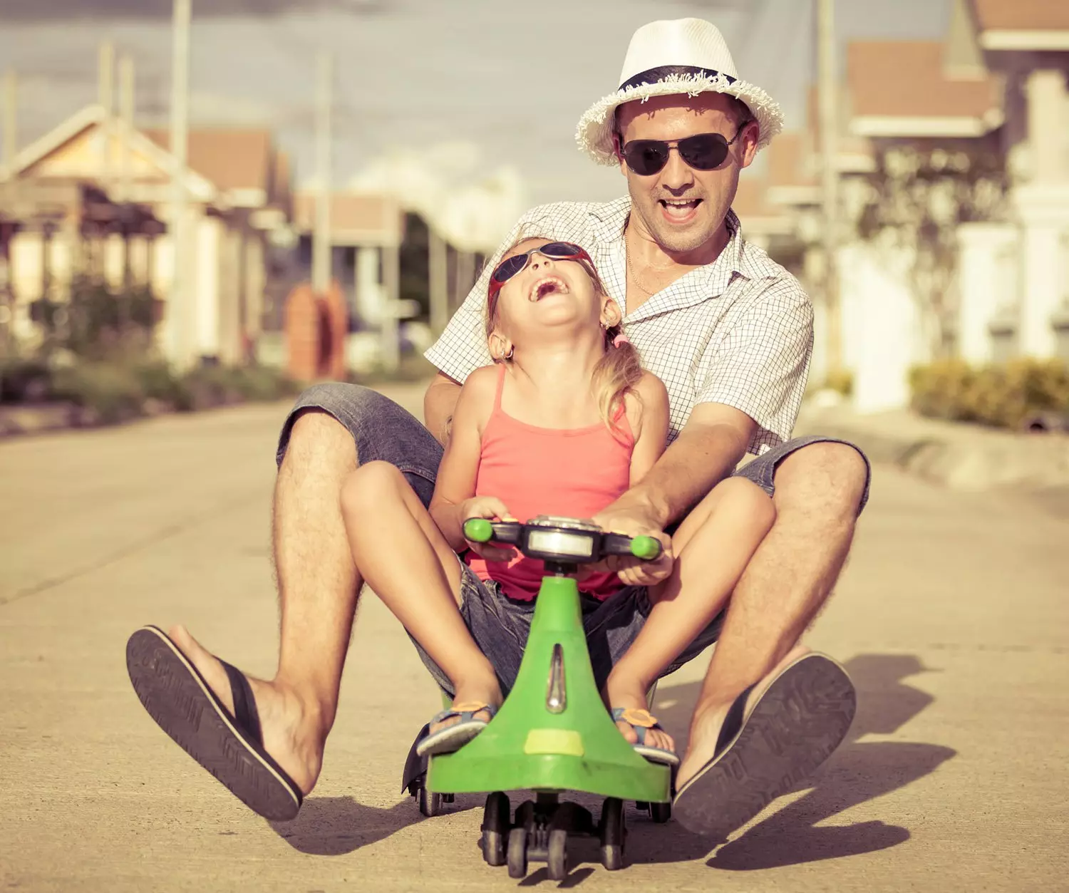 Father and daughter on scooter