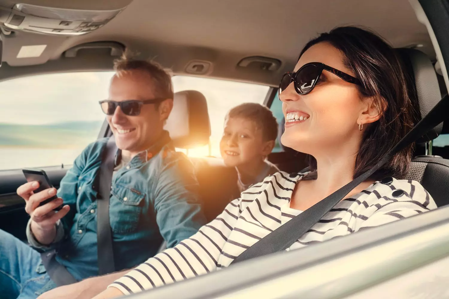 Happy family driving