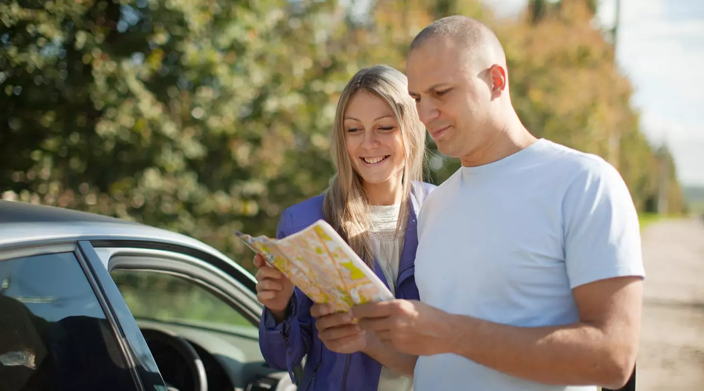 Man and woman looking at a map