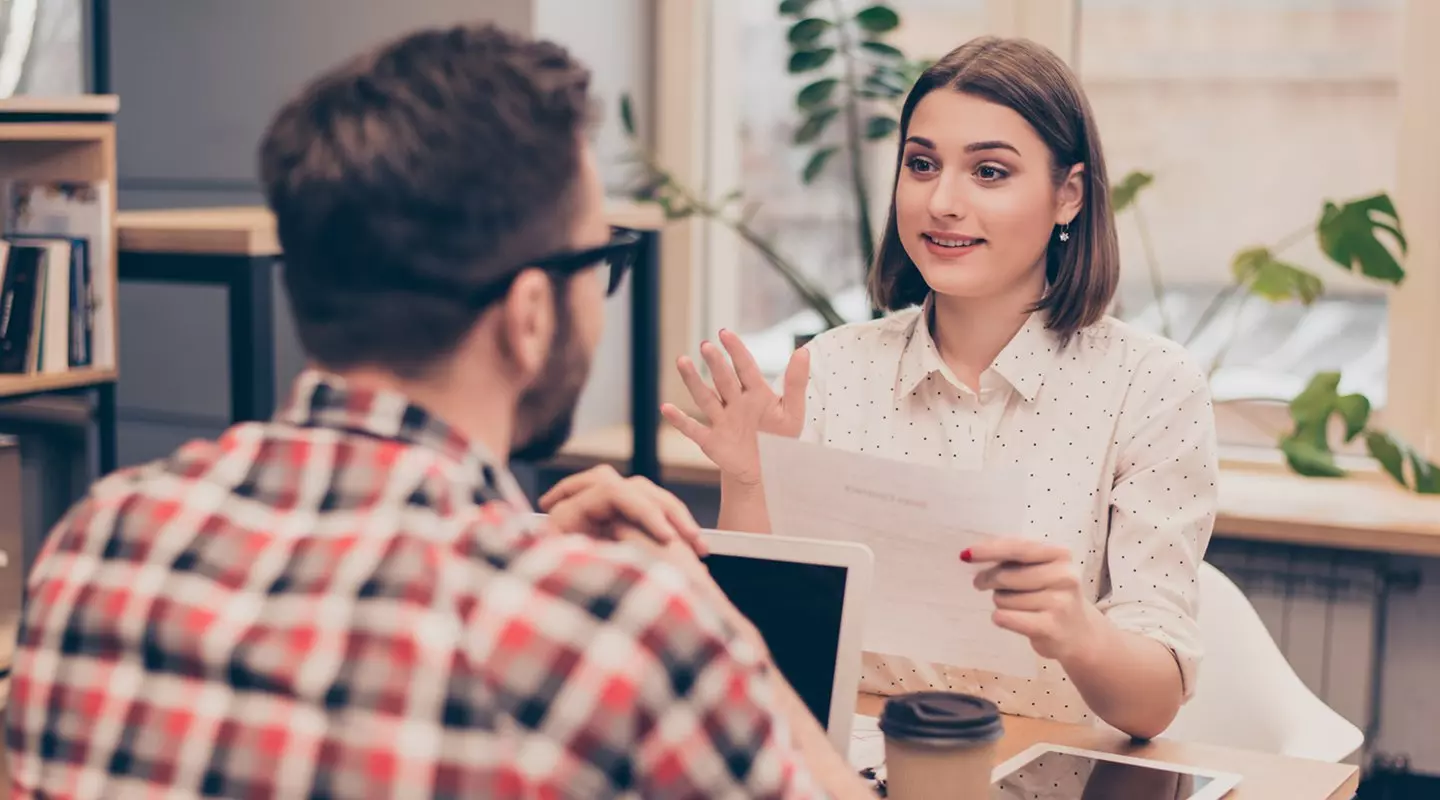 Woman and man talking business meeting