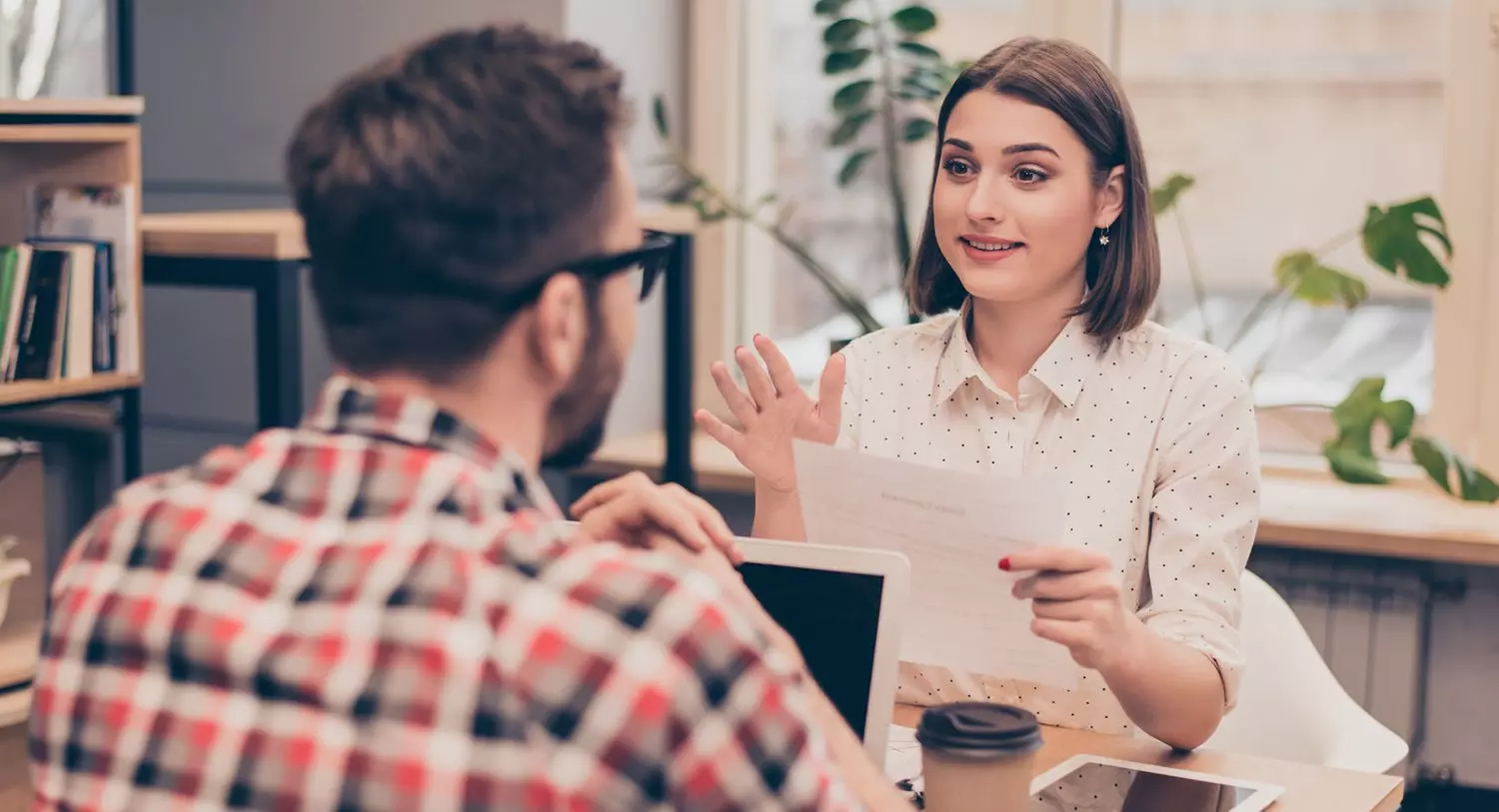 Woman and man talking business meeting