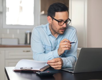 How much should you keep in checking and how much in savings?