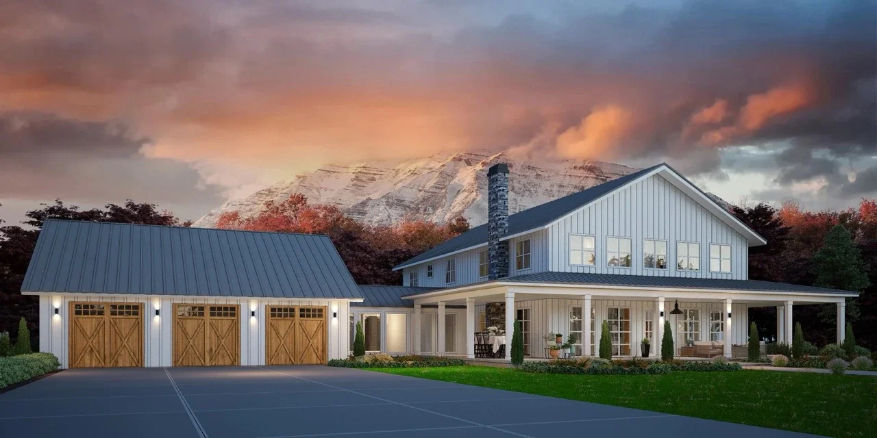 large white barndominium with garage