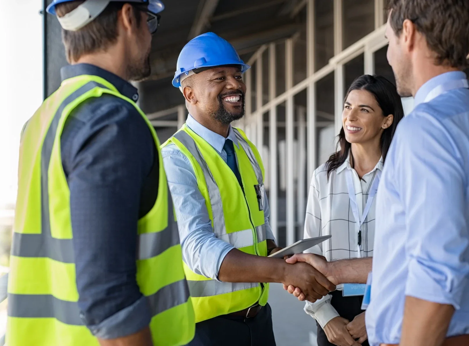 construction worker and bankers working together