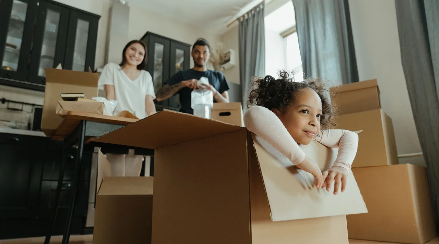 family with moving boxes
