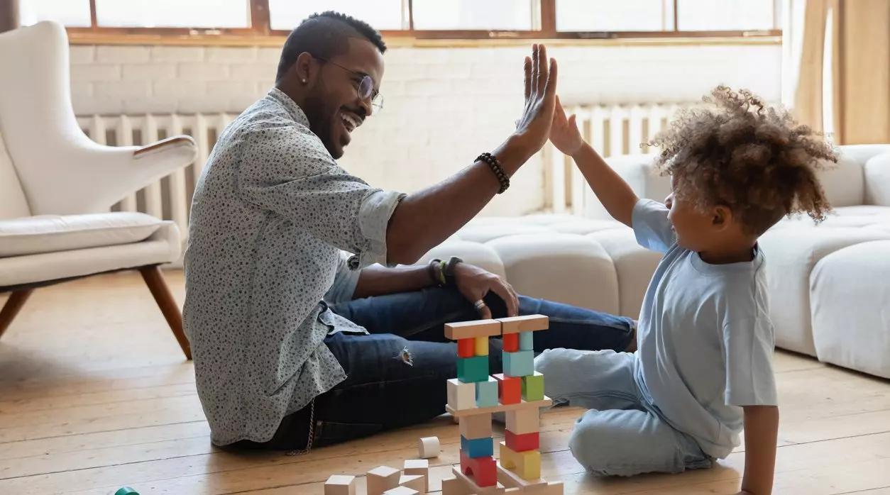 Dad and son building blocks