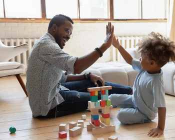 Dad and son building blocks