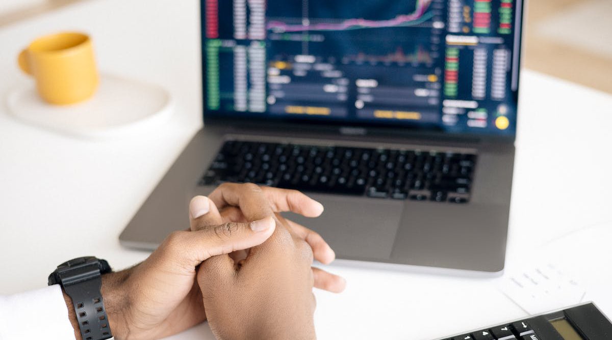 financial graphs on laptop screen