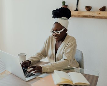 happy woman using a laptop