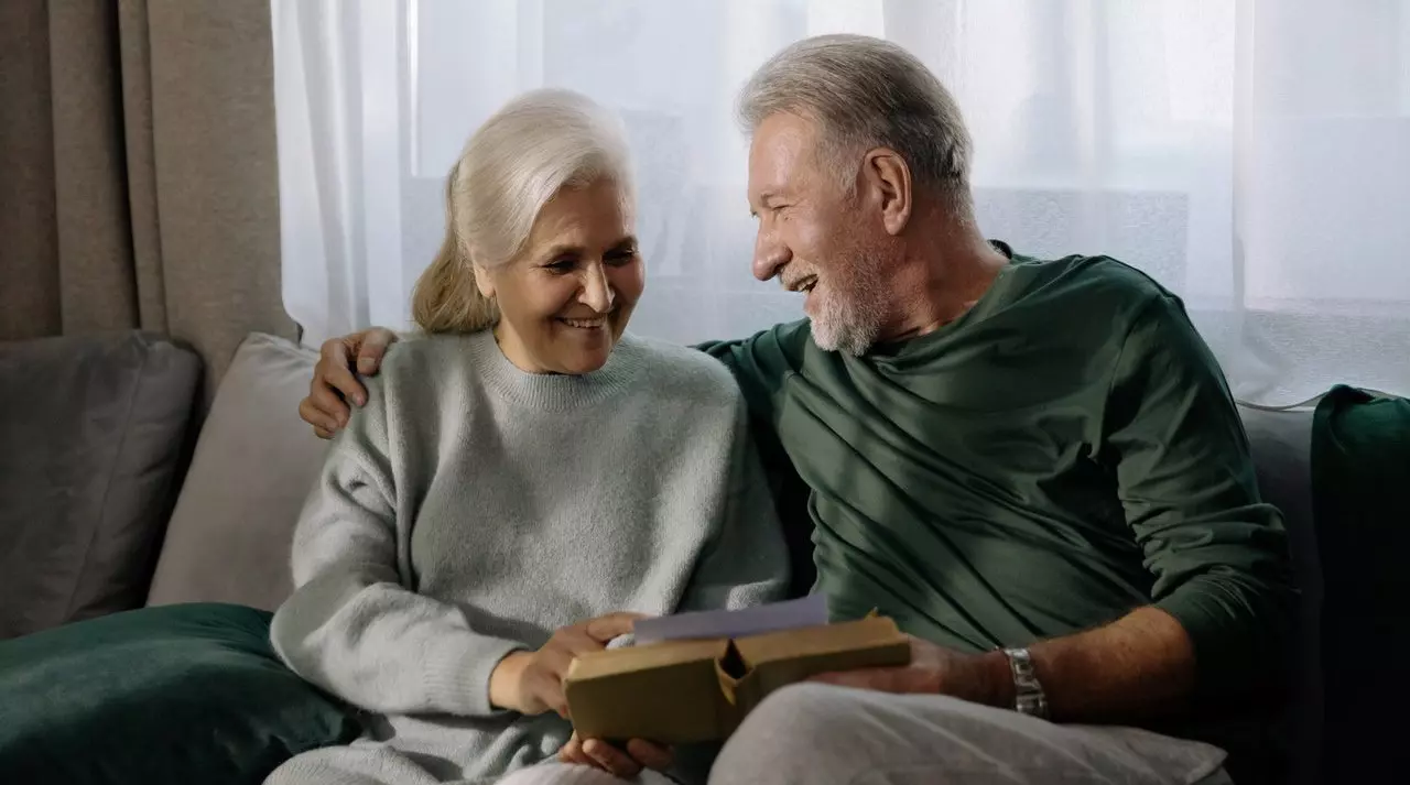 older couple reading a book