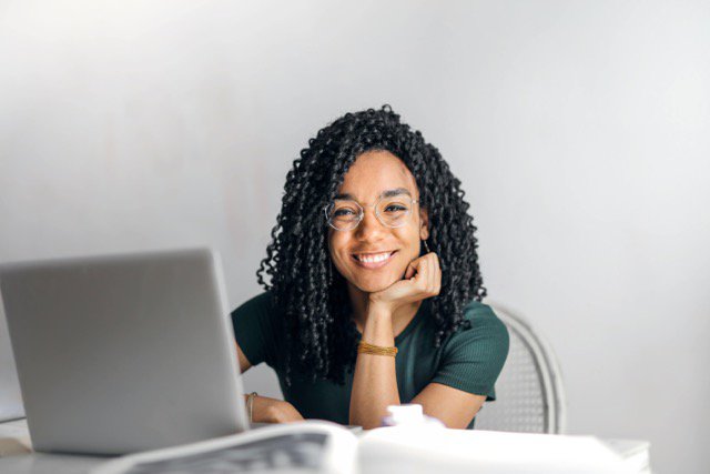 woman smiling with laptop