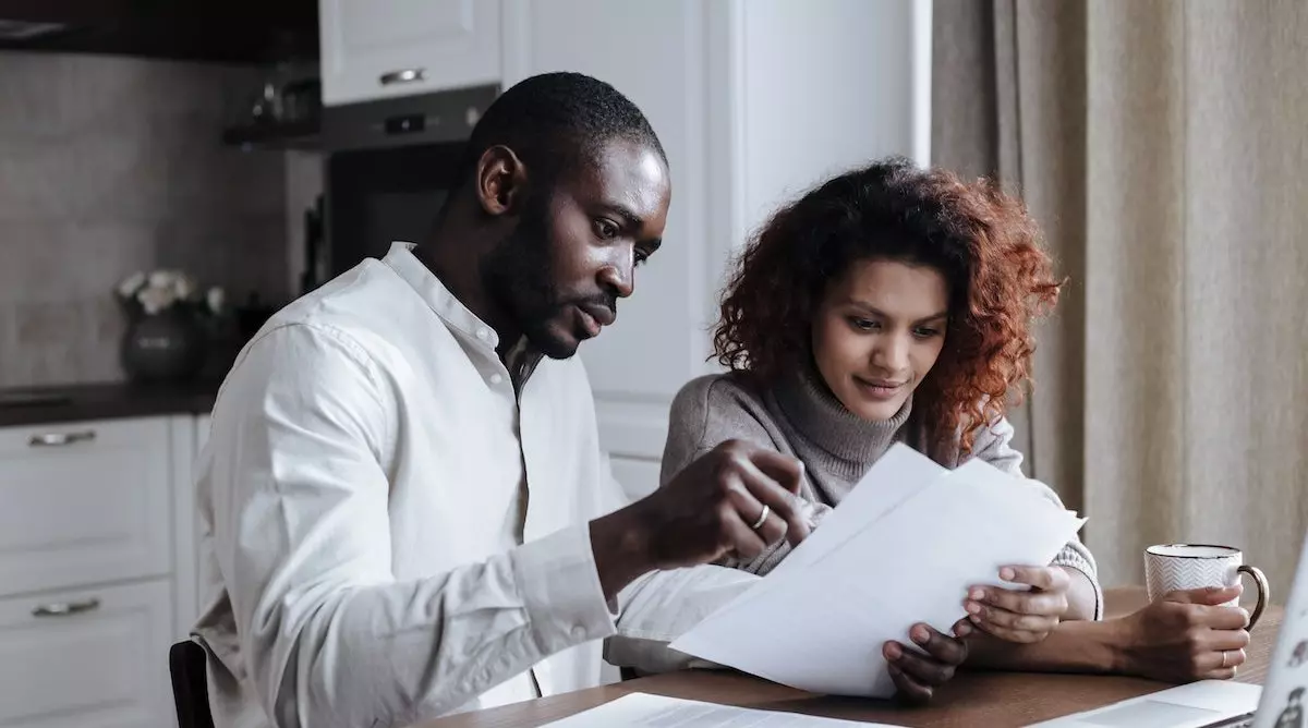 couple evaluating mortgage loan offers