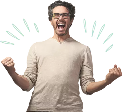 Excited smiling man making two fists wearing glasses and a beige t-shirt.